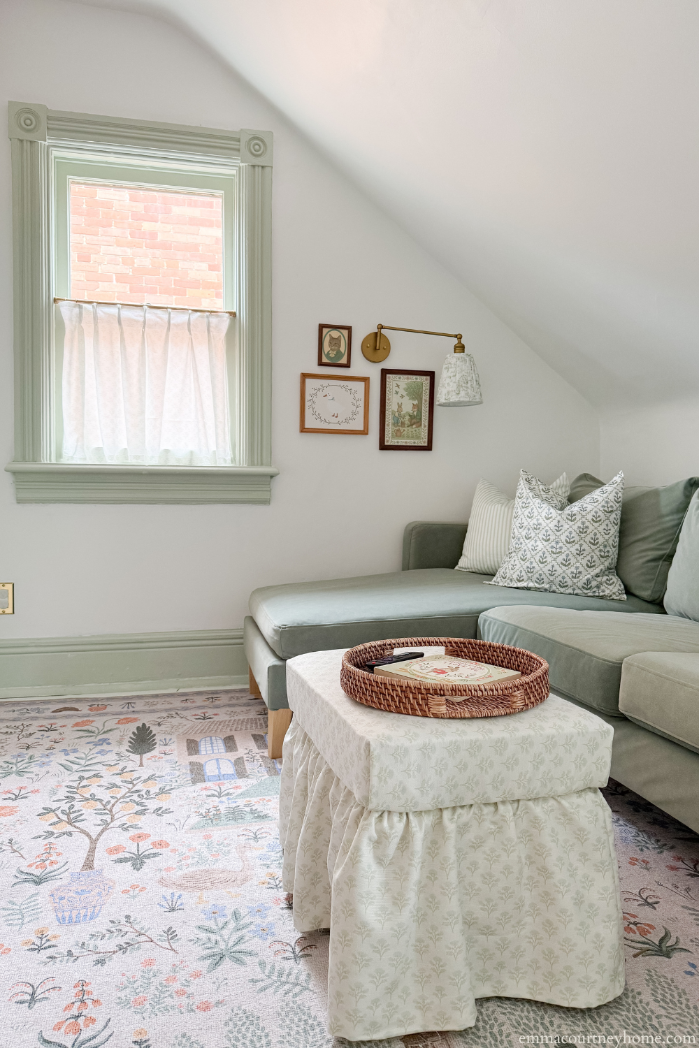 Custom block print pillows on slipcovered sofa in soft, earthy tones