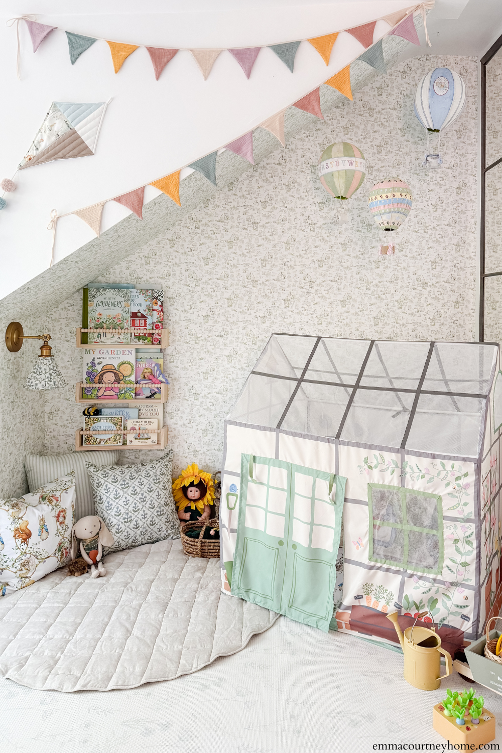 Spoonflower toile wallpaper with Peter Rabbit–inspired pattern behind seating area