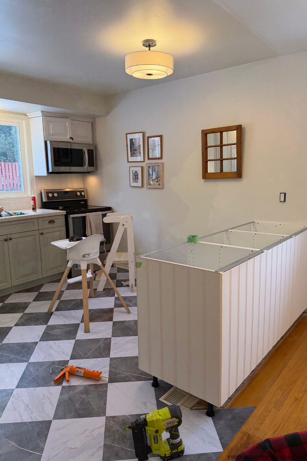 Beadboard paneling added to IKEA peninsula in a budget-friendly kitchen makeover