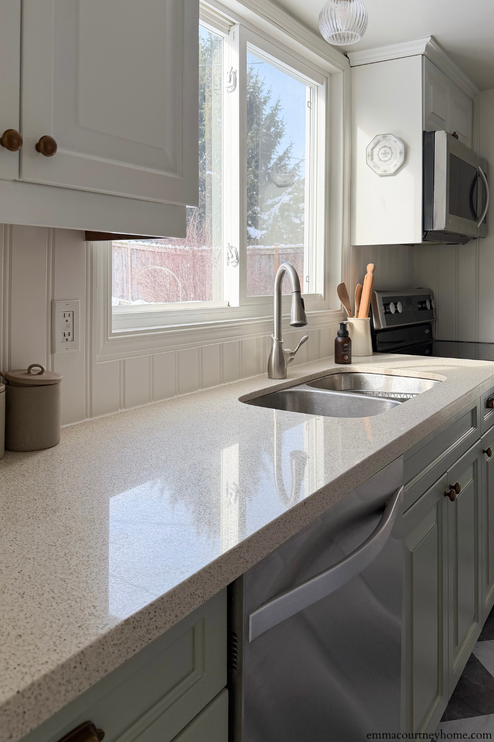 Beadboard backsplash installed over existing tile in a budget-friendly kitchen makeover