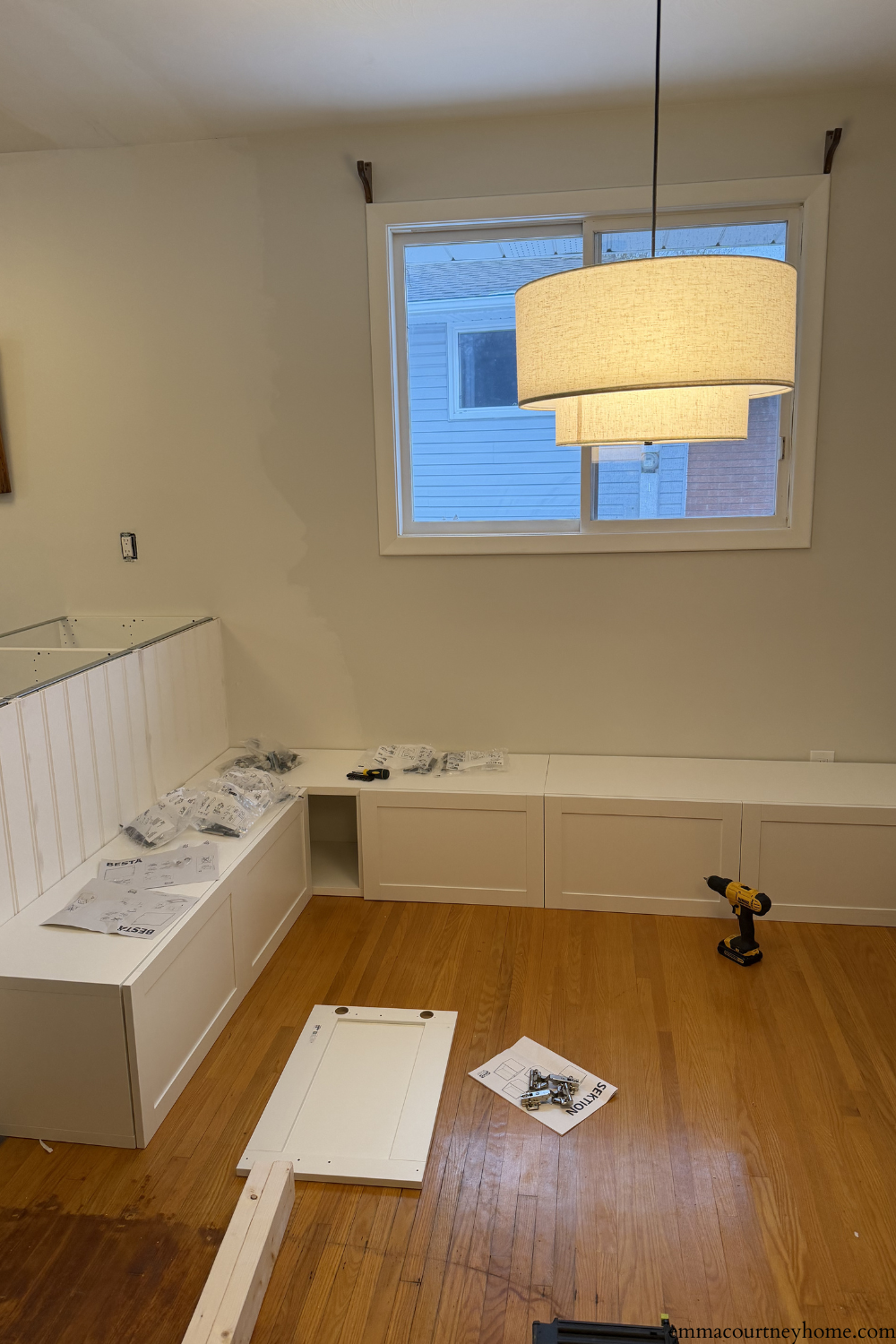 IKEA Besta cabinets arranged for L-shaped breakfast nook banquette